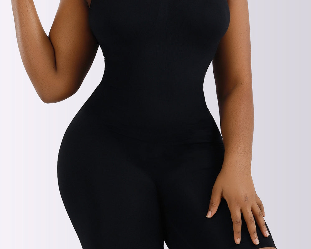 NEWYORKLISTED Intimate Apparel Collection: Black bodysuit worn by a model on a white background