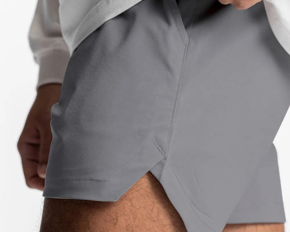 NEWYORKLISTED ATLAS MEN'S COLLECTION: Gray athletic shorts worn by a person on a white background