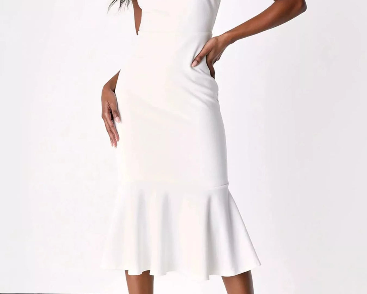 NEWYORKLISTED STYLE COLLECTION: A woman modeling a white sleeveless midi dress with a square neckline, side cutout, and flared ruffle hem against a plain white studio background.