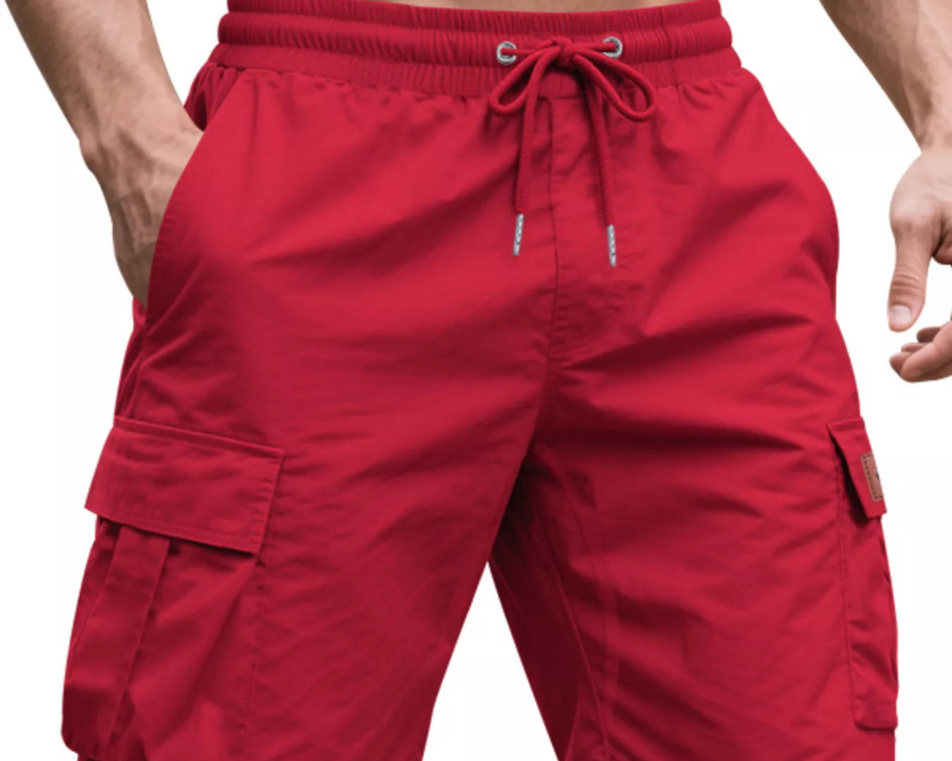 NEWYORKLISTED ATLAS MEN'S COLLECTION: Red cargo shorts worn by a person on a white background