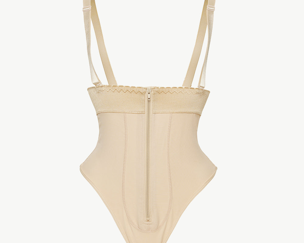 NEWYORKLISTED Intimate Apparel: Beige swimsuit with thin straps on a white background