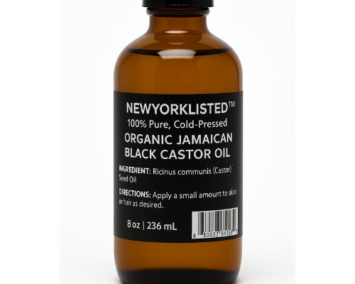 Brown glass bottle of Newyorklisted Organic Jamaican Black Castor Oil on a white background