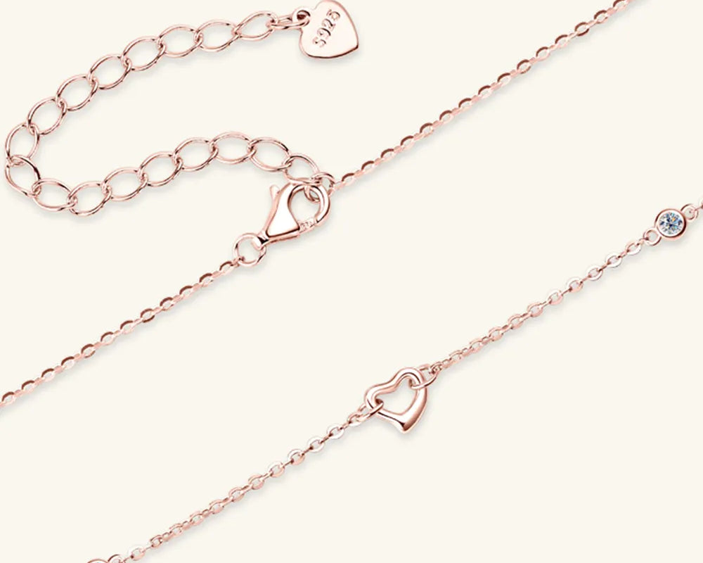 NEWYORKLISTED Valentine’s Day Specials: Rose gold anklets with heart-shaped clasp on a white background