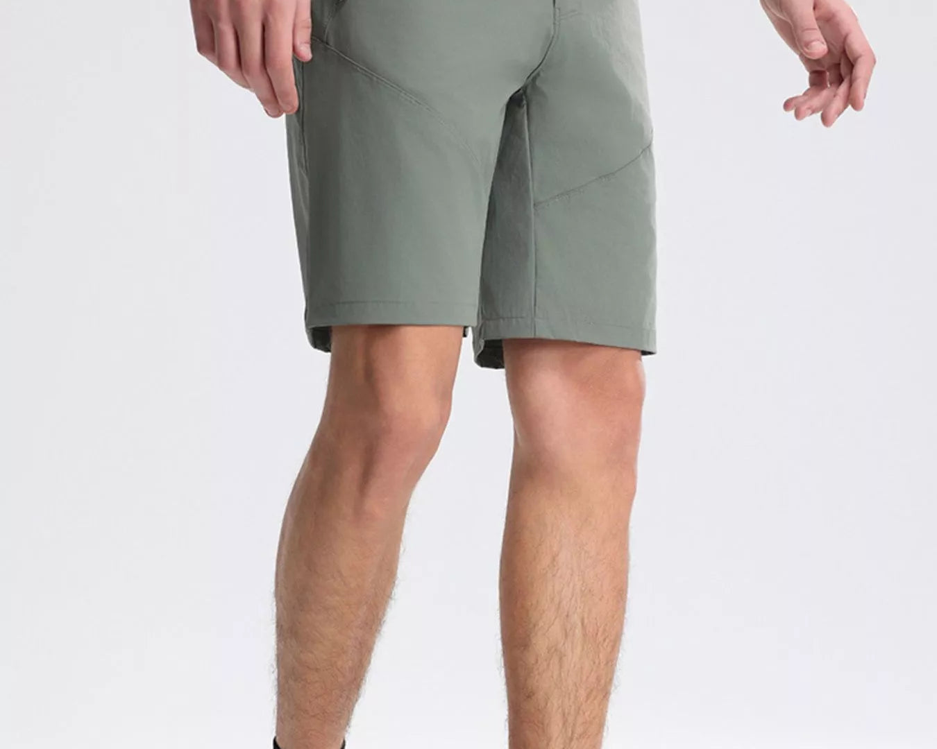 NEWYORKLISTED ATLAS MEN's COLLECTION: Person wearing green shorts on a white background