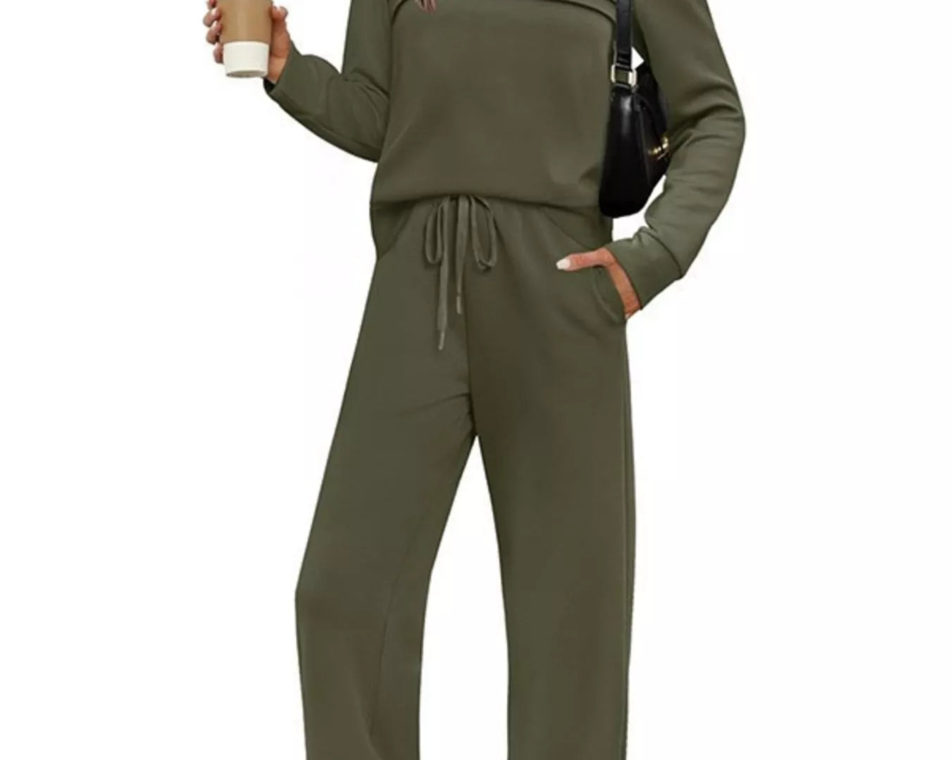 NEWYORKLISTED COMFORT COLLECTION: Woman wearing a green tracksuit holding a coffee cup on a white background