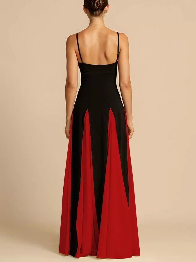 NEWYORKLISTED STYLE COLLECTION: Woman wearing a black and red dress with a plain background
