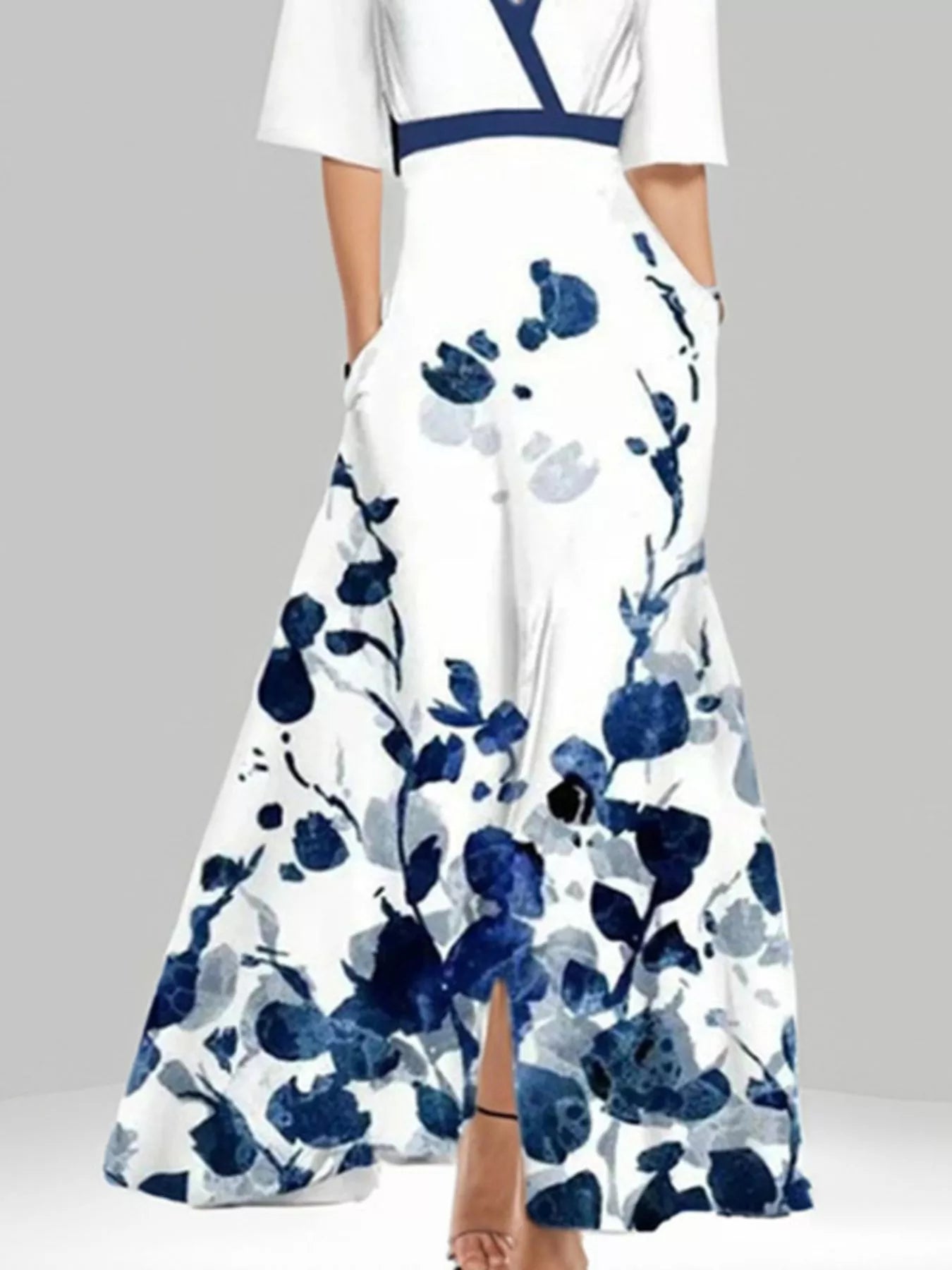 NEWYORKLISTED STYLE COLLECTION: White dress with blue floral pattern on a gray background