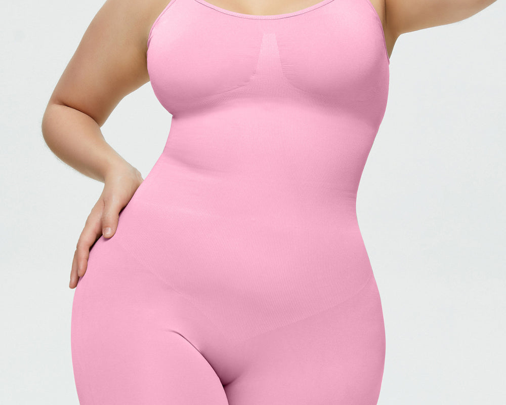 NEWYORKLISTED Intimate Apparel Collection: Person wearing a pink bodysuit against a plain background