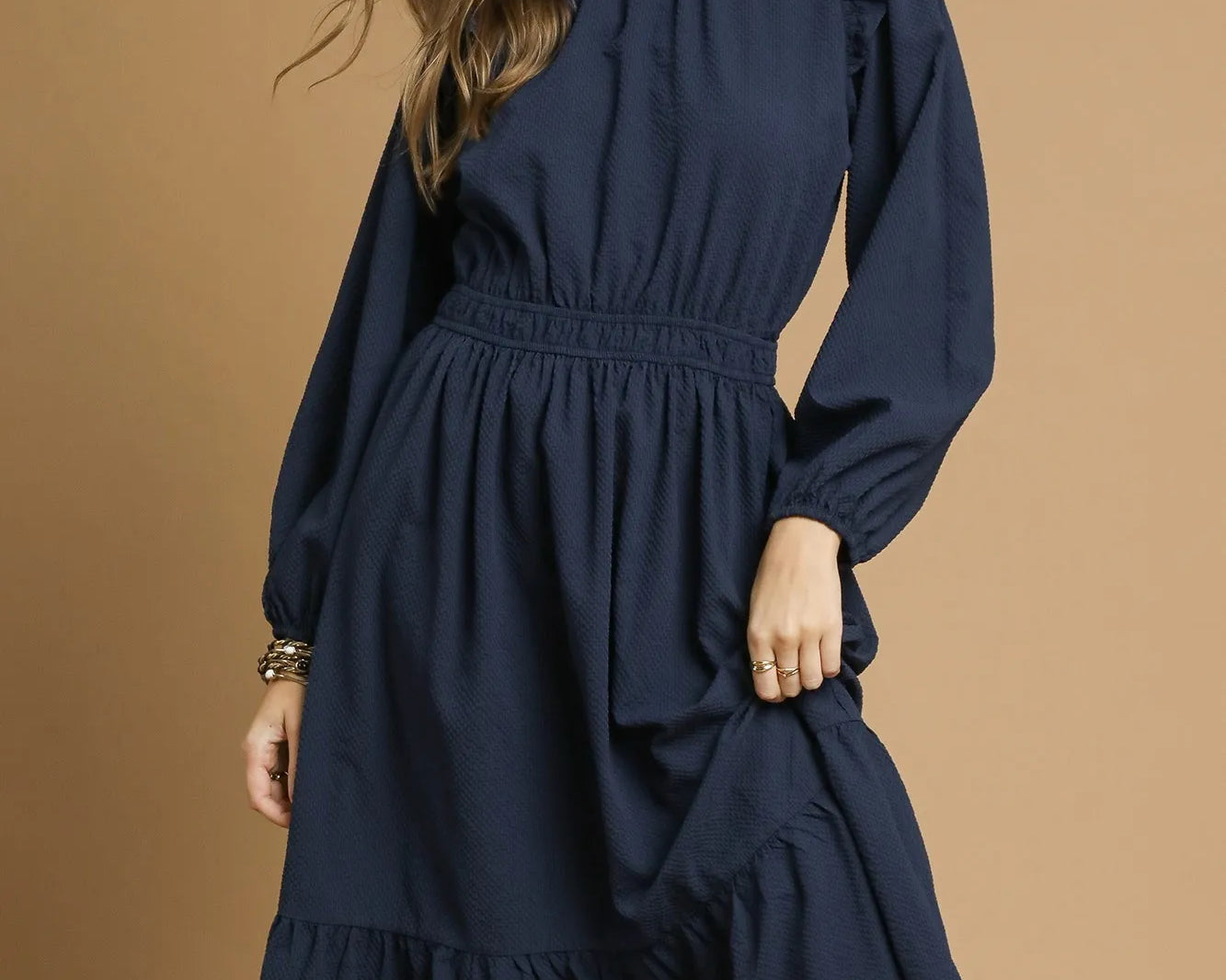 Textured midi dress with ruffle shoulder detail from NEWYORKLISTED STYLE COLLECTION – chic and versatile women’s fashion.