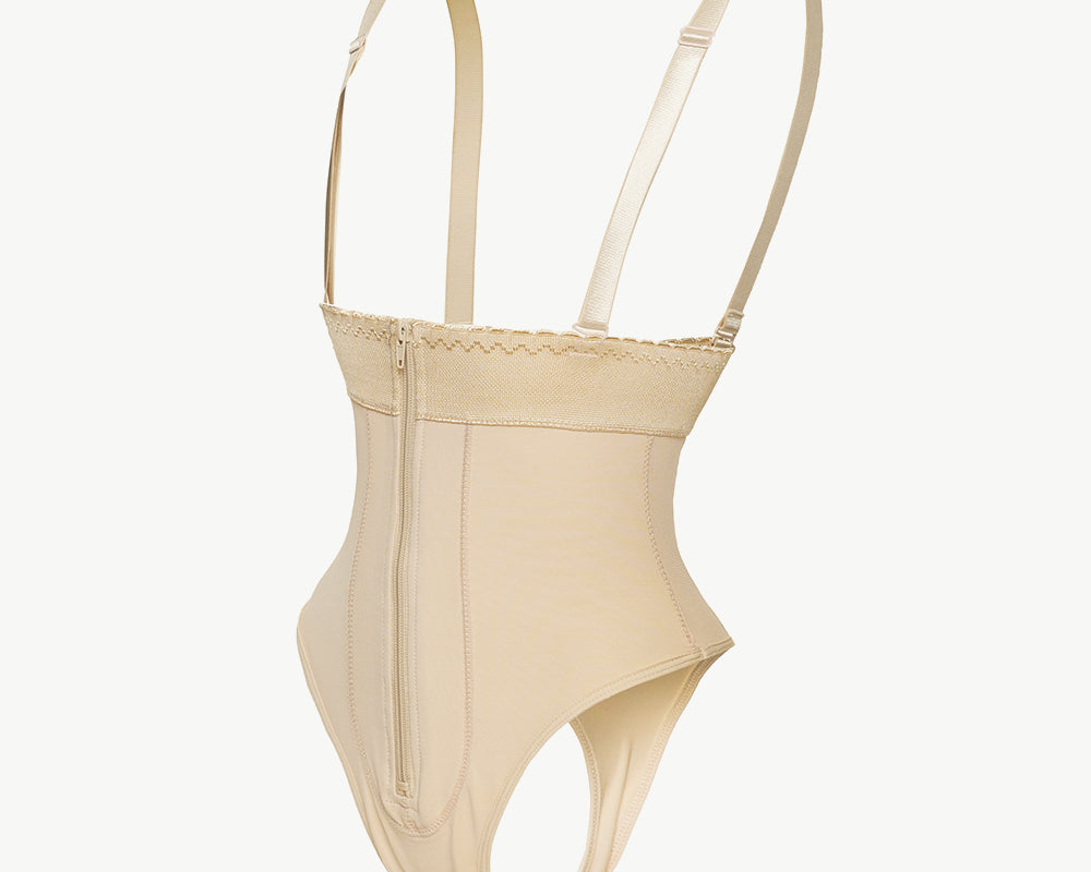 NEWYORKLISTED Intimate Apparel: Beige swimsuit with thin straps on a white background