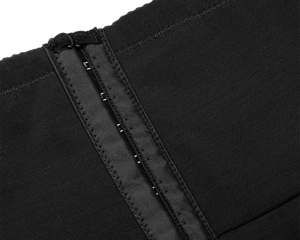 NEWYORKLISTED Intimate Apparel: Close-up of a black bag with straps on a white background