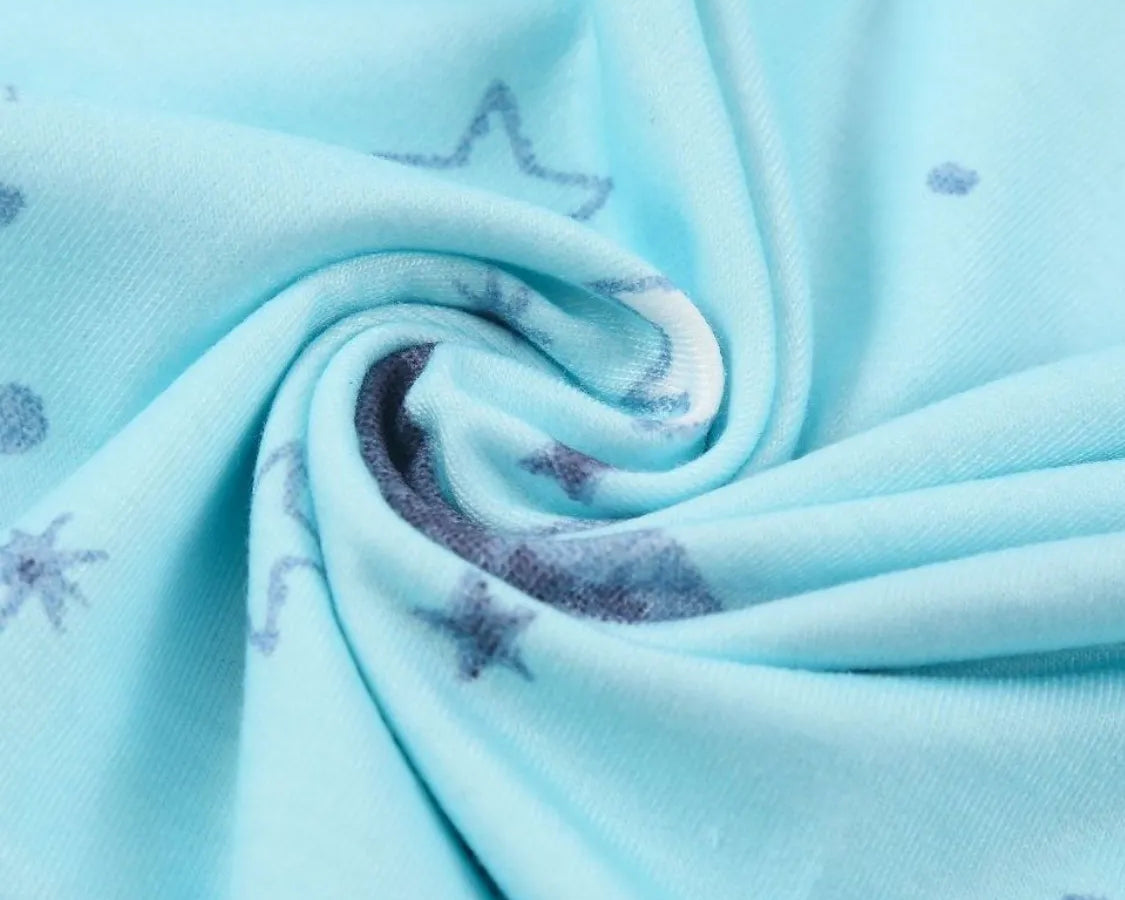 NEWYORKLISTED Intimate Apparel: Light blue fabric with star patterns, possibly from a children's product or clothing.