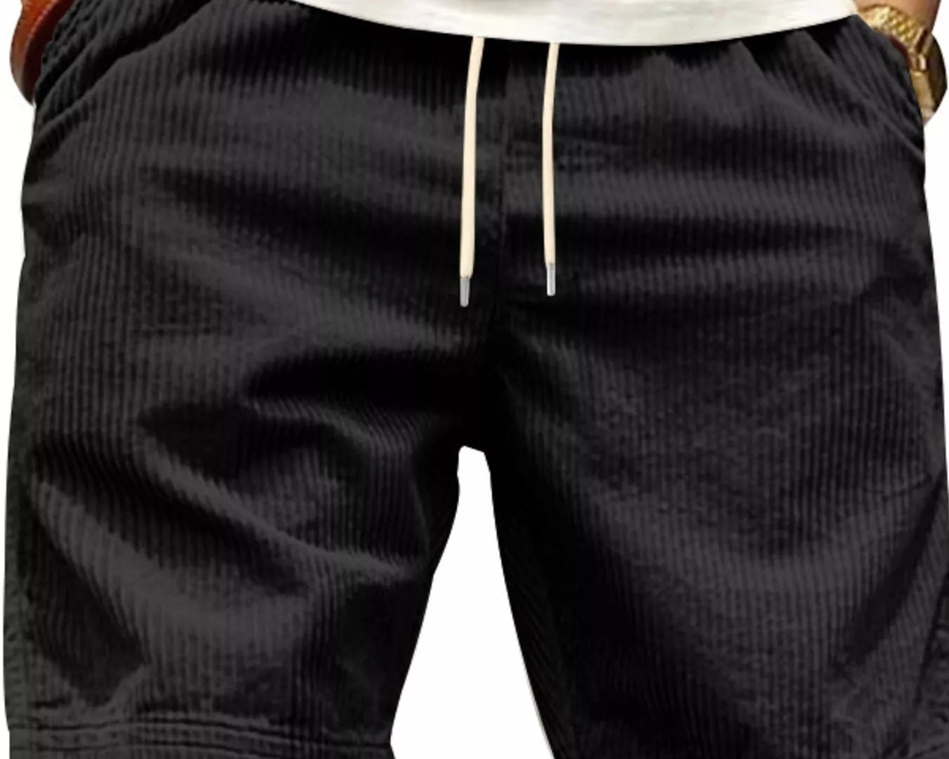 NEWYORKLISTED ATLAS MEN'S COLLECTION: Black shorts worn by a person on a plain background