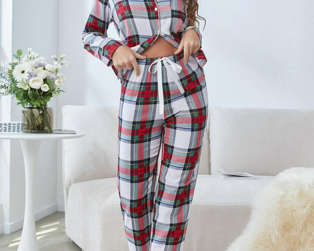 NEWYORKLISTED Intimate Apparel: Woman wearing a plaid pajama set in a living room.