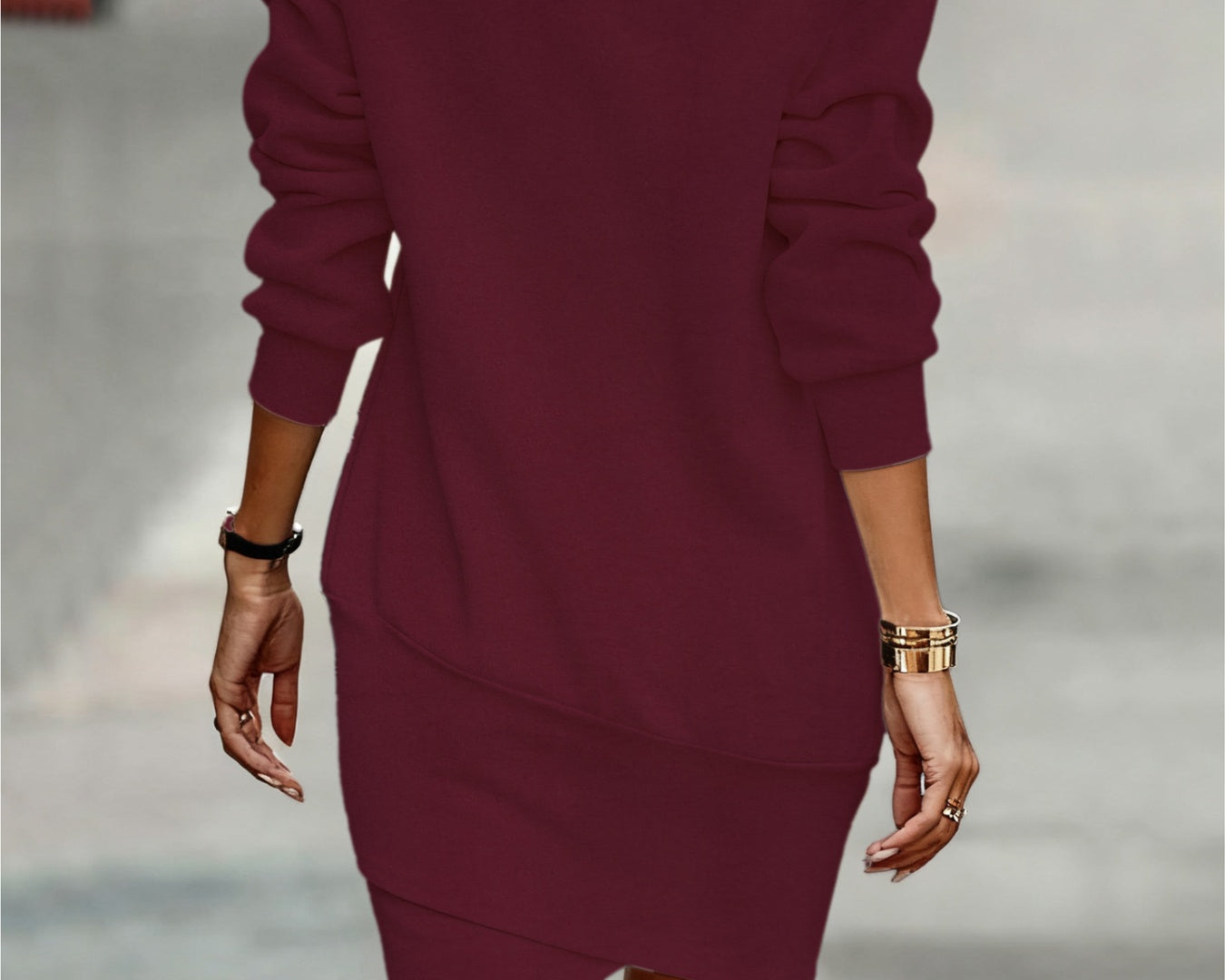 NEWYORKLISTED Style Collection: Maroon dress worn by a person on a blurred street background