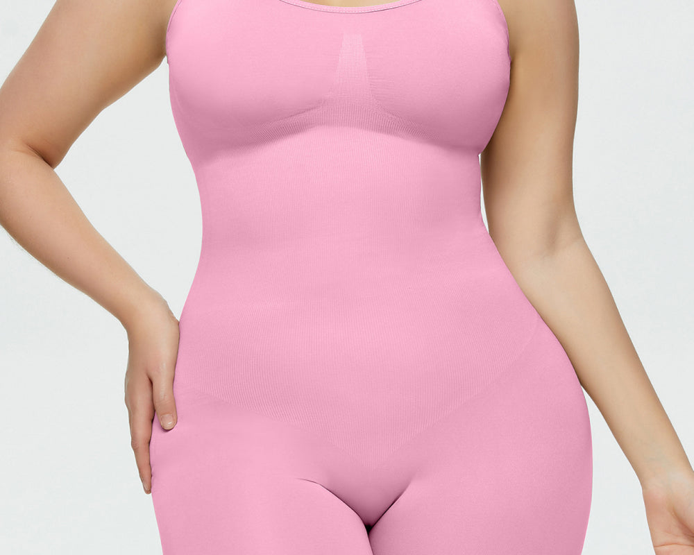 NEWYORKLISTED Intimate Apparel Collection: Person wearing a pink bodysuit against a plain background