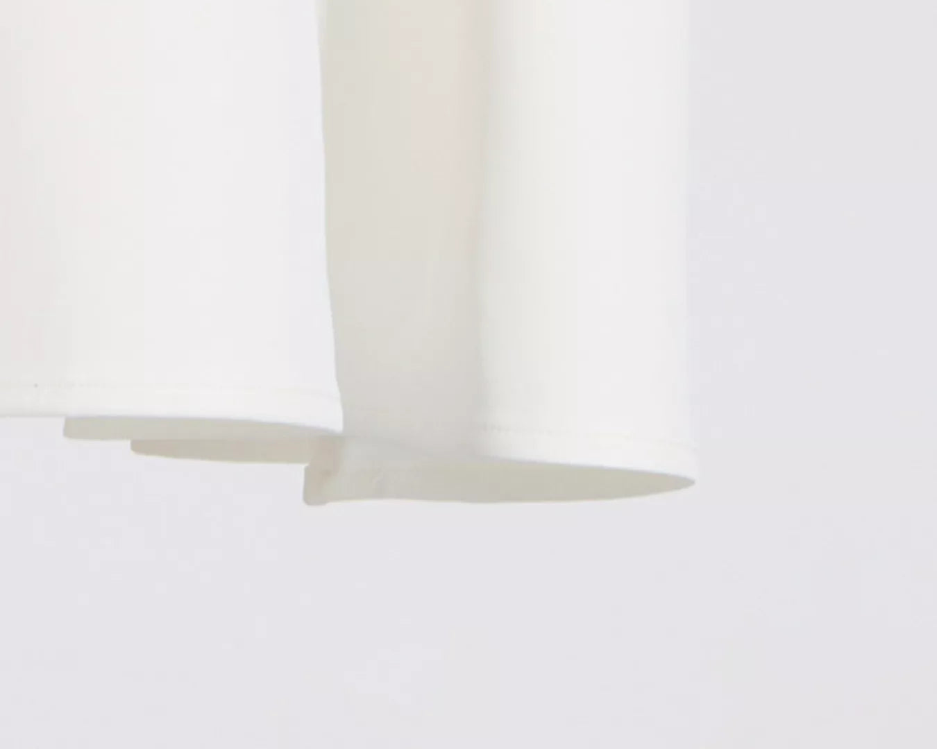NEWYORKLISTED STYLE COLLECTION: Close-up of a white curtain with a blurred background