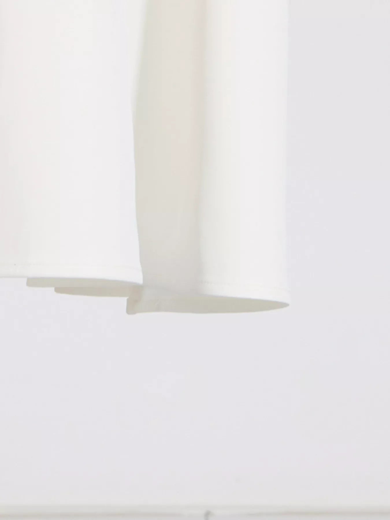 NEWYORKLISTED STYLE COLLECTION: Close-up of a white curtain with a blurred background