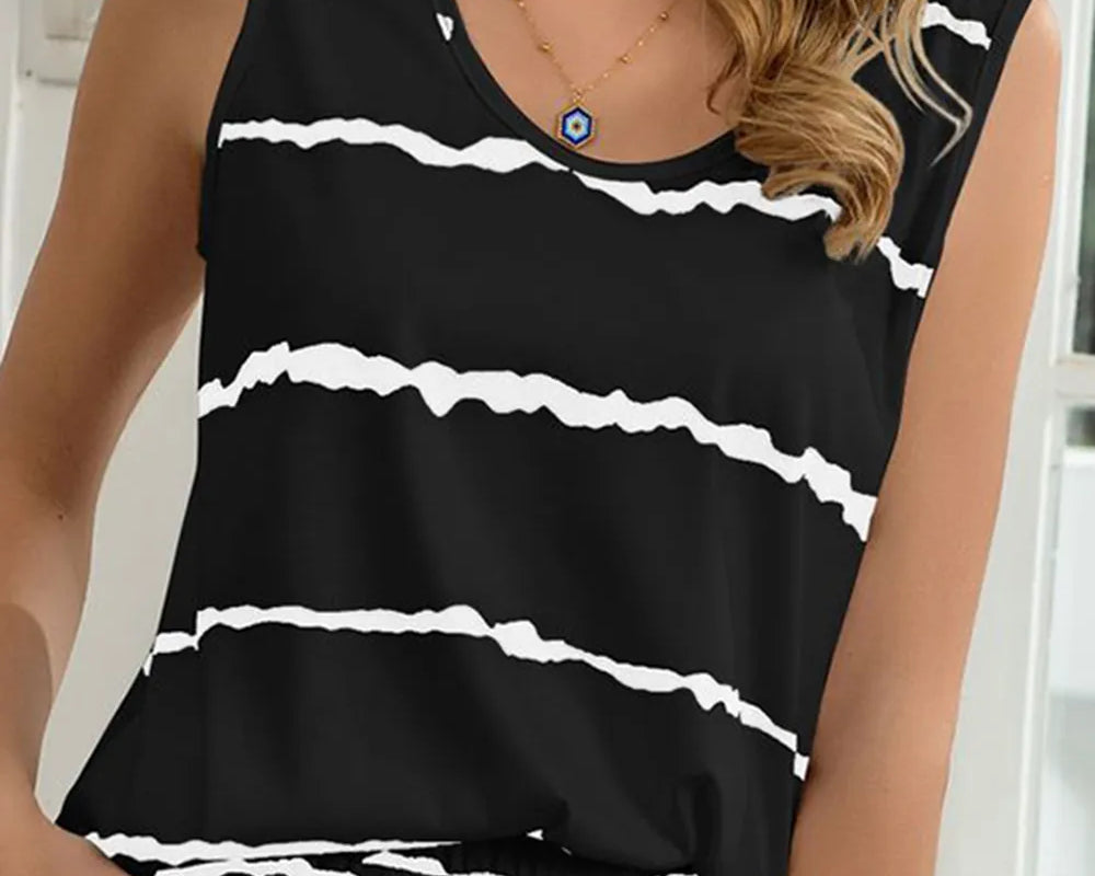 NEWYORKLISTED Intimate Apparel: Black sleeveless top with white stripes worn by a person indoors.