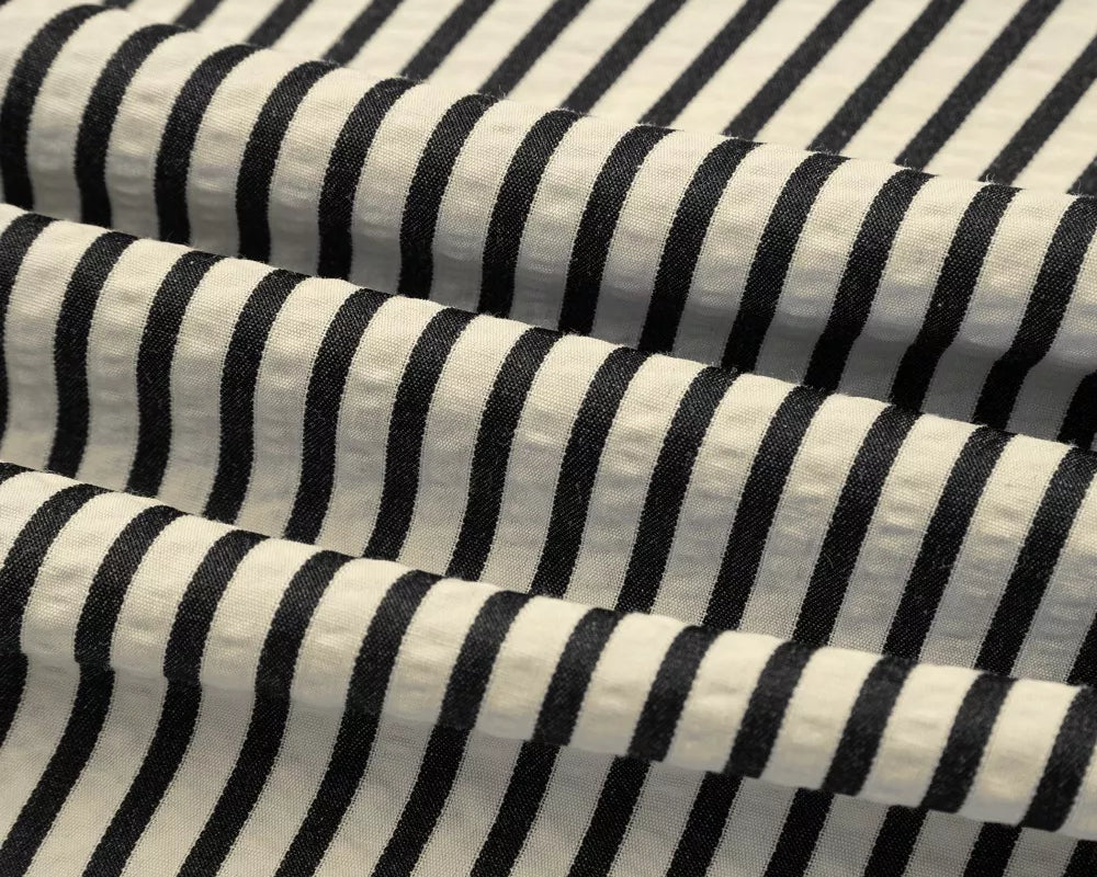 NEWYORKLISTED STYLE COLLECTION: Close-up of black and white striped fabric