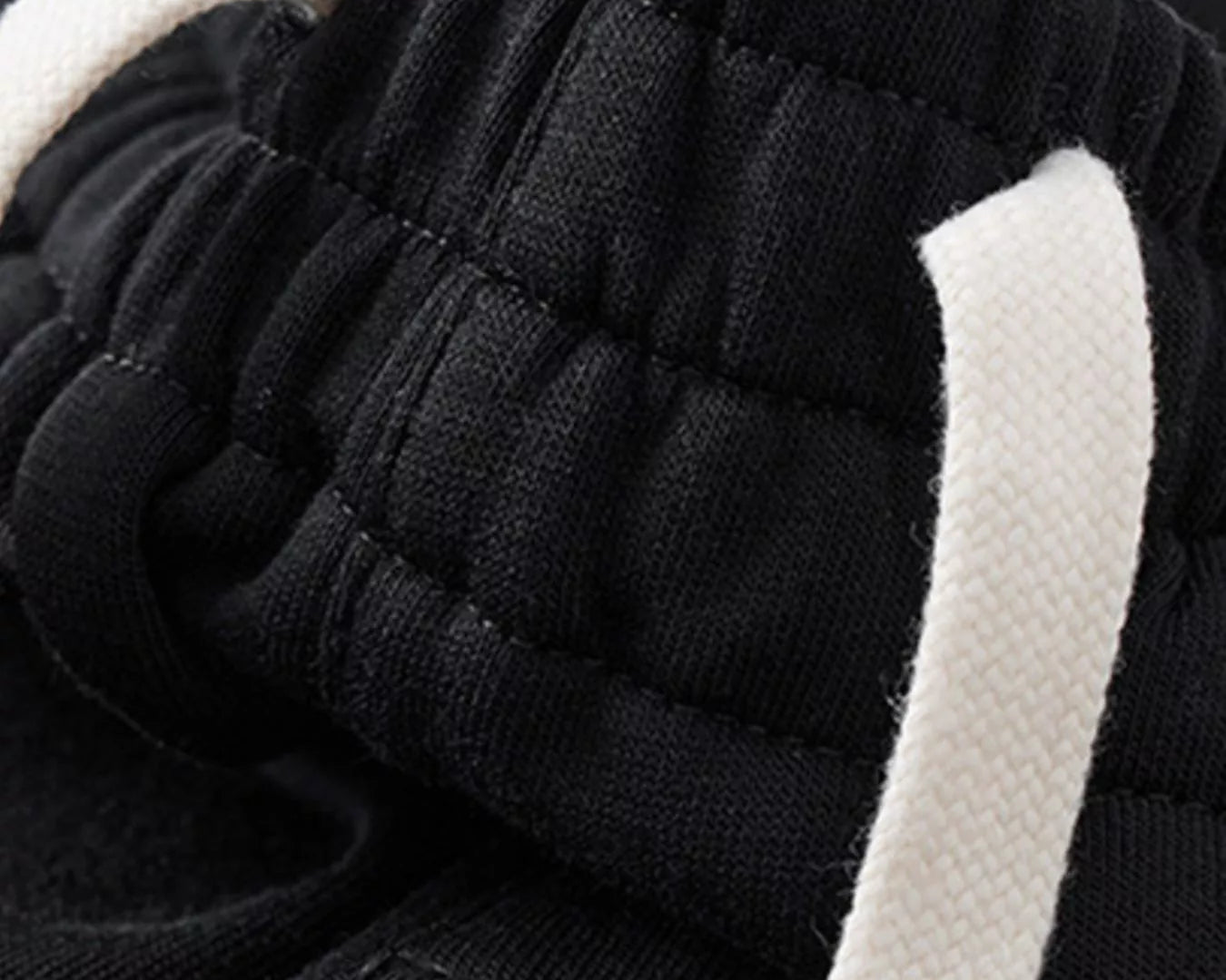NEWYORKLISTED ATLAS MEN's COLLECTION: Close-up of black and white fabric with textured pattern