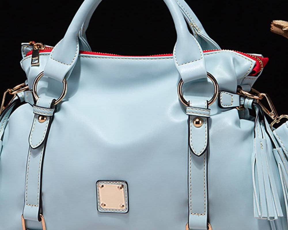 NEWYORKLISTED STYLE COLLECTION: Vegan Leather Handbag with Tassels - NEWYORKLISTED