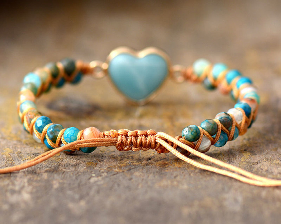 NEWYORKLISTED Valentine’s Day Specials: Bracelet with turquoise heart charm on a textured surface