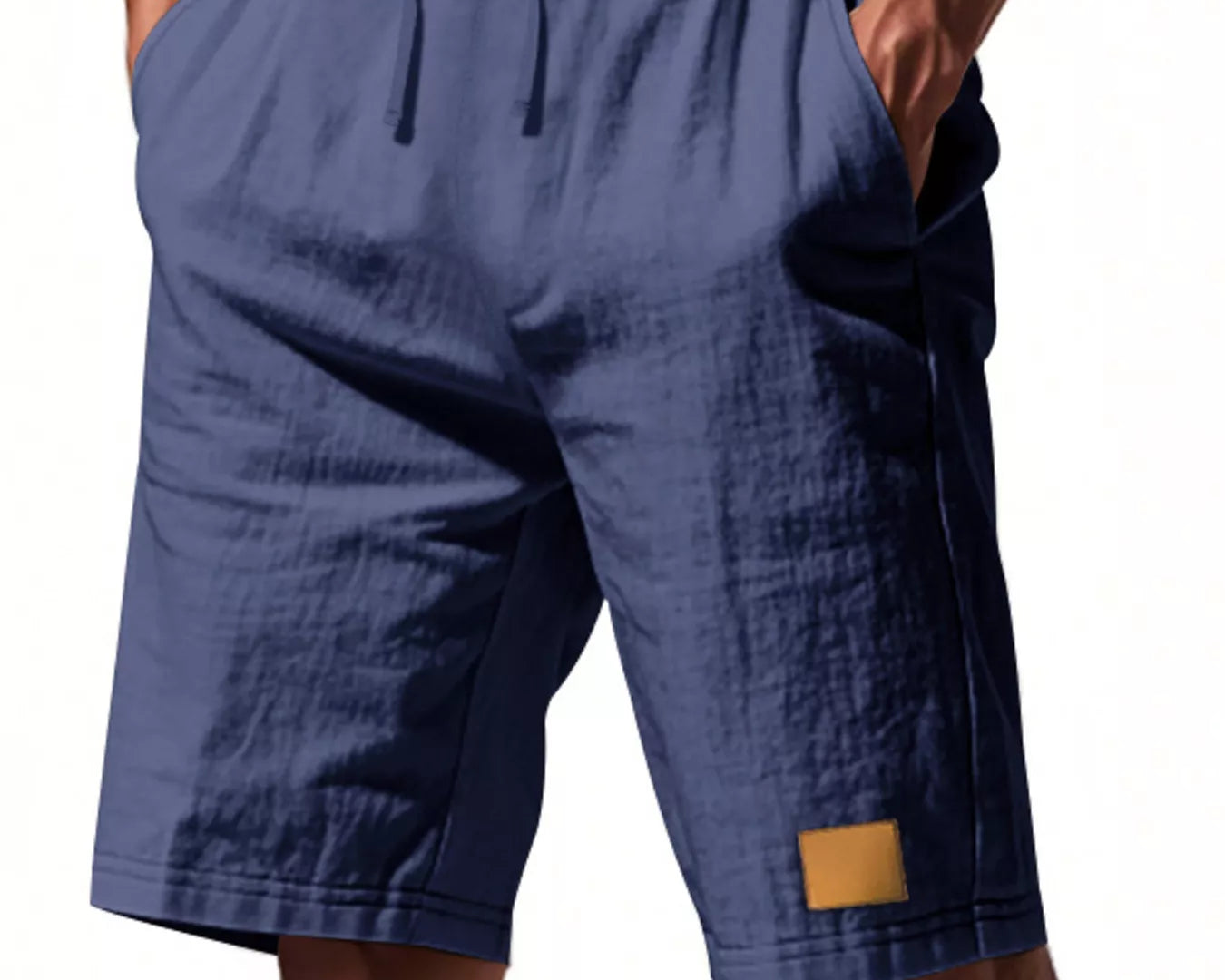 NEWYORKLISTED ATLAS MEN'S COLLECTION: Blue shorts worn by a person on a white background