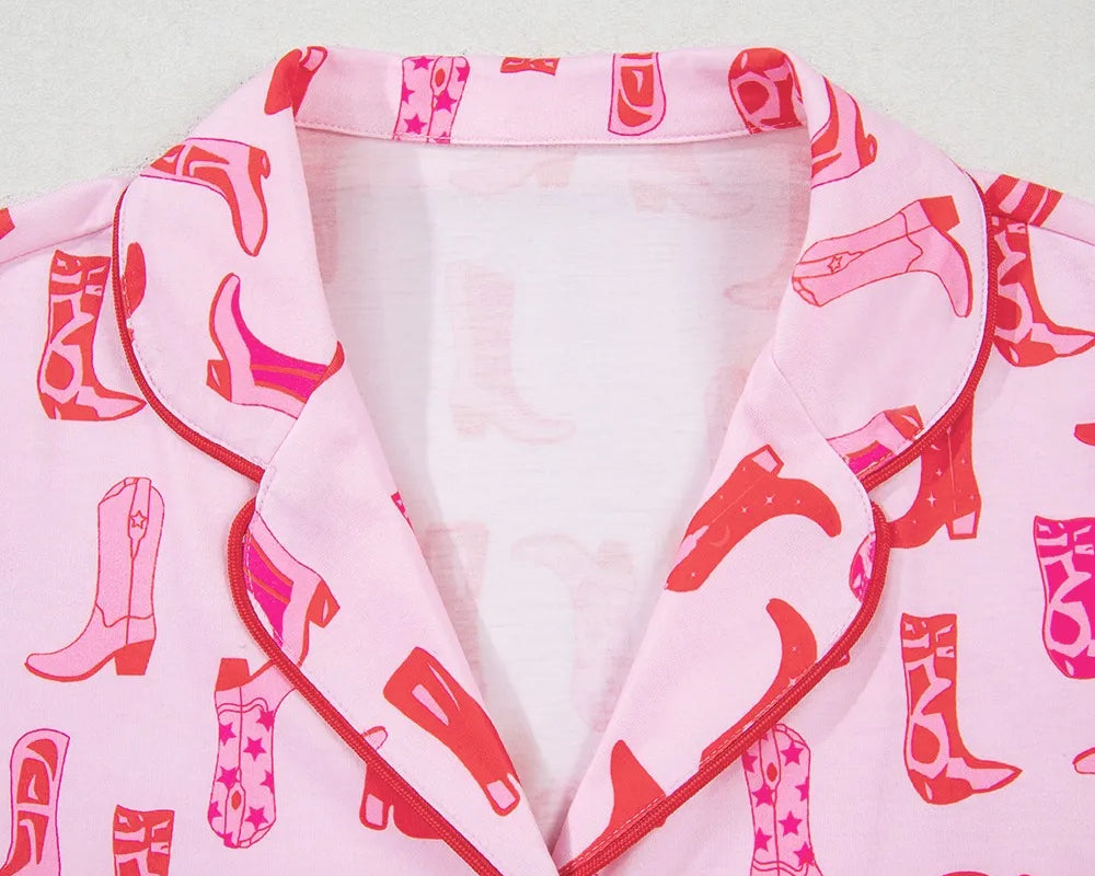 NEWYORKLISTED Intimate Apparel: Pink robe with red cowboy boot pattern on a white background