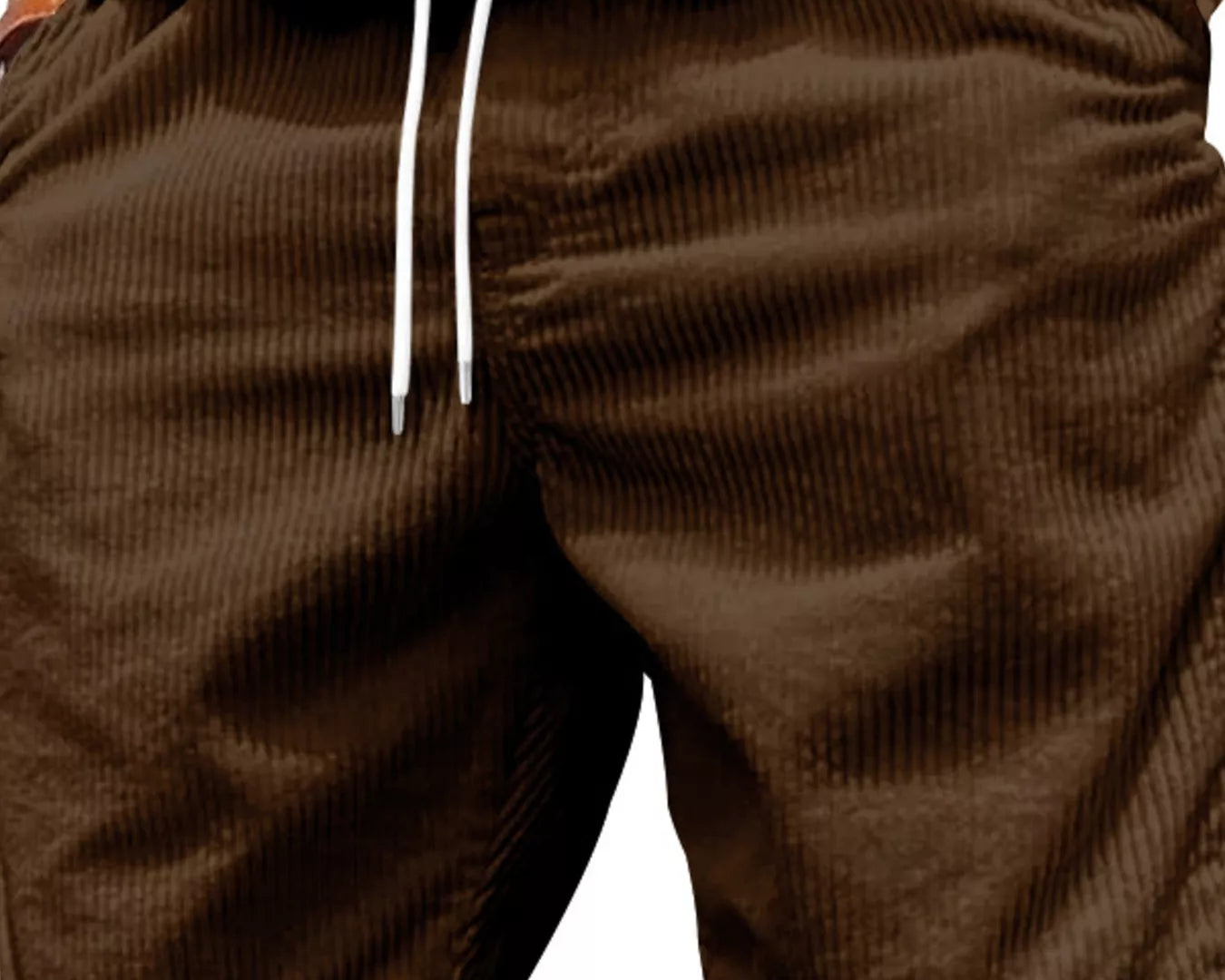 NEWYORKLISTED ATLAS MEN'S COLLECTION: Brown shorts with white drawstrings worn by a person on a white background