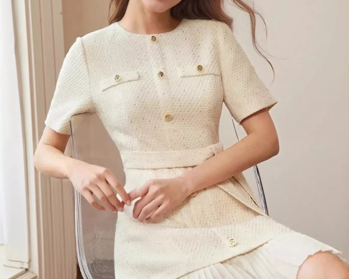 NEWYORKLISTED STYLE COLLECTION Pleated Hem Round Neck Dress – belted cream dress with gold buttons and pleated hem