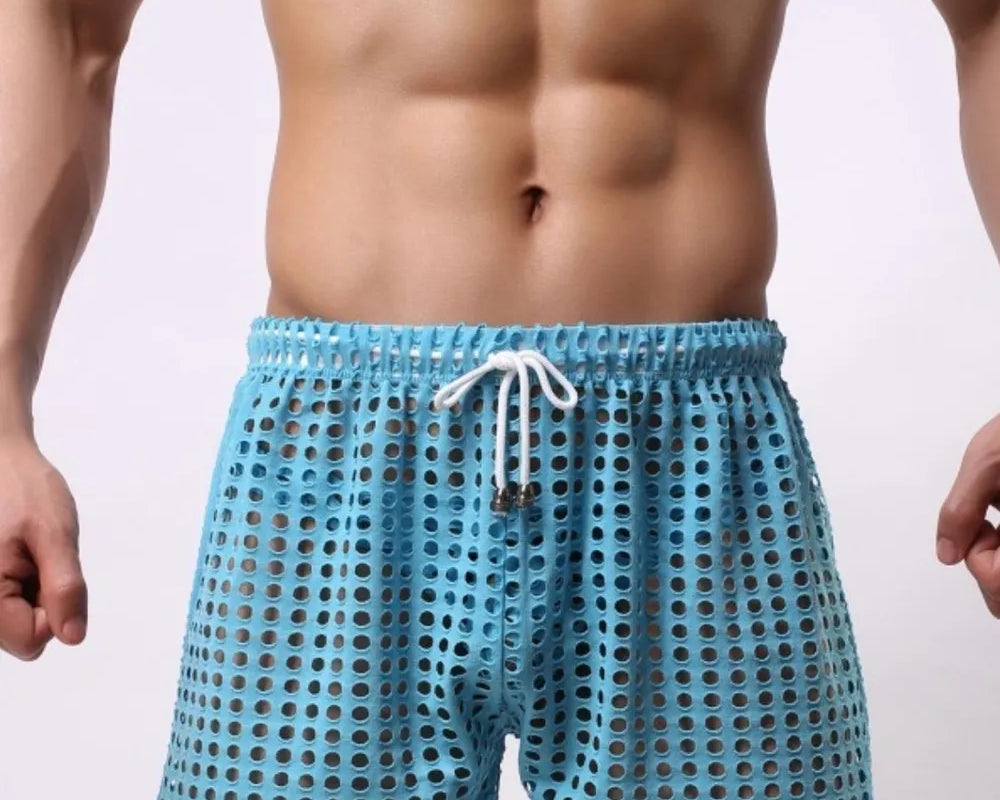 NEWYORKLISTED ATLAS MEN'S COLLECTION: Blue swim shorts with a white drawstring on a plain background