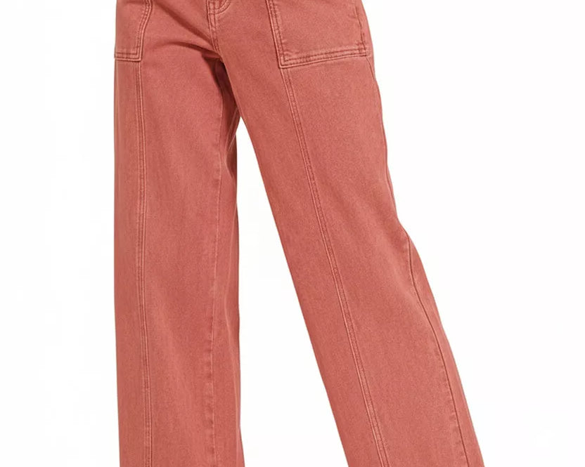 NEWYORKLISTED Style Collection: Pink jeans worn by a person on a white background