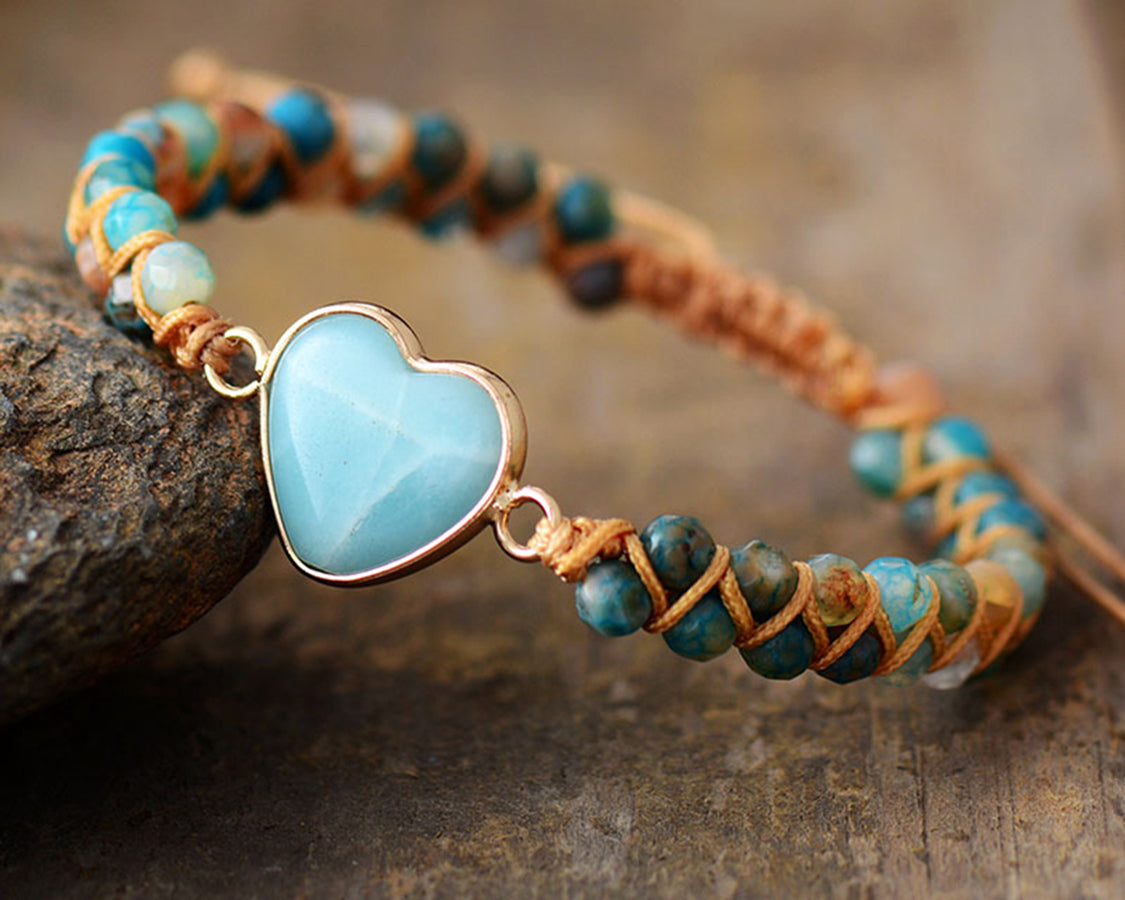 NEWYORKLISTED Valentine’s Day Specials: Bracelet with heart-shaped turquoise stone on a wooden surface