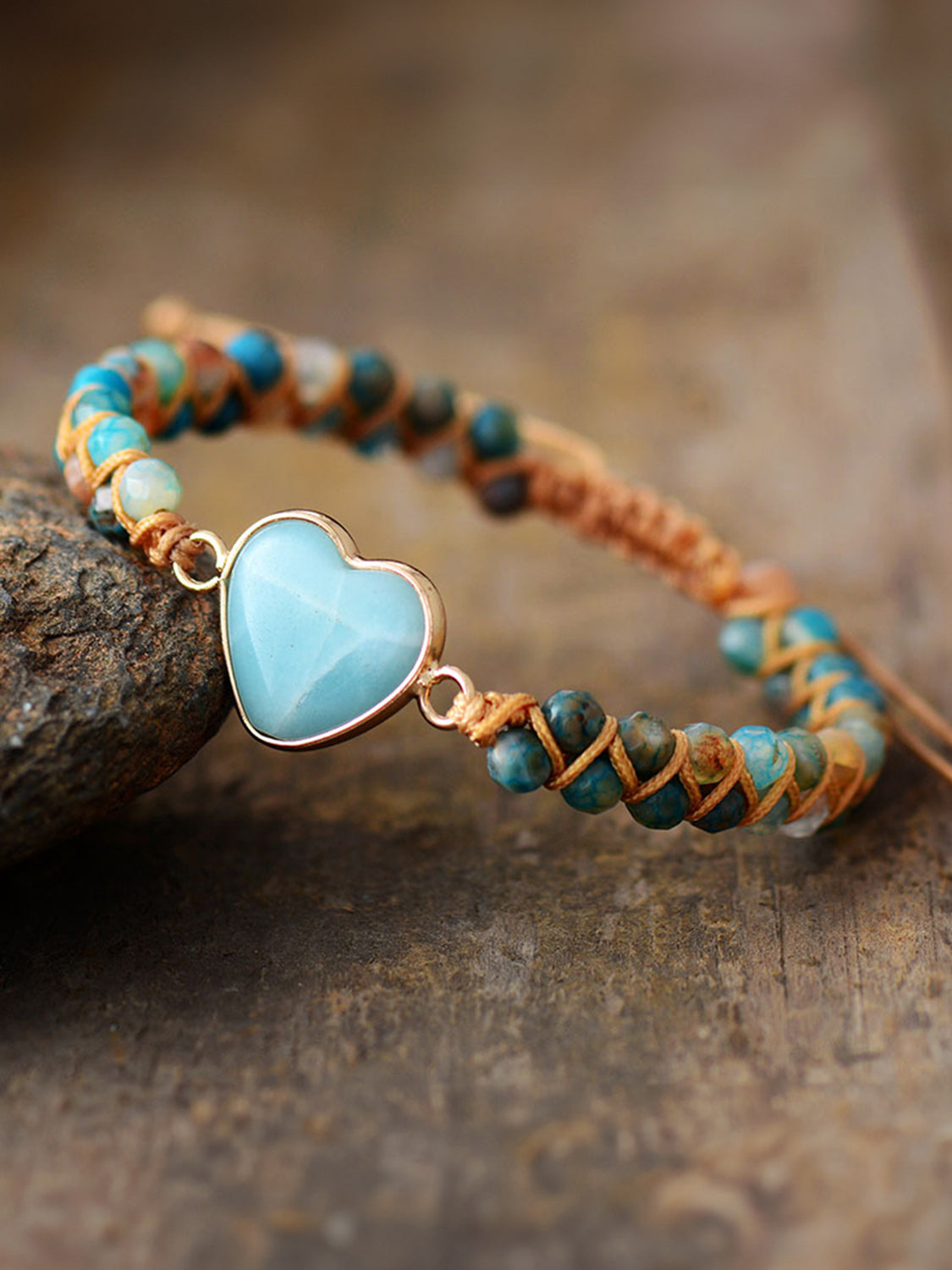 NEWYORKLISTED Valentineās Day Specials: Bracelet with heart-shaped turquoise stone on a wooden surface
