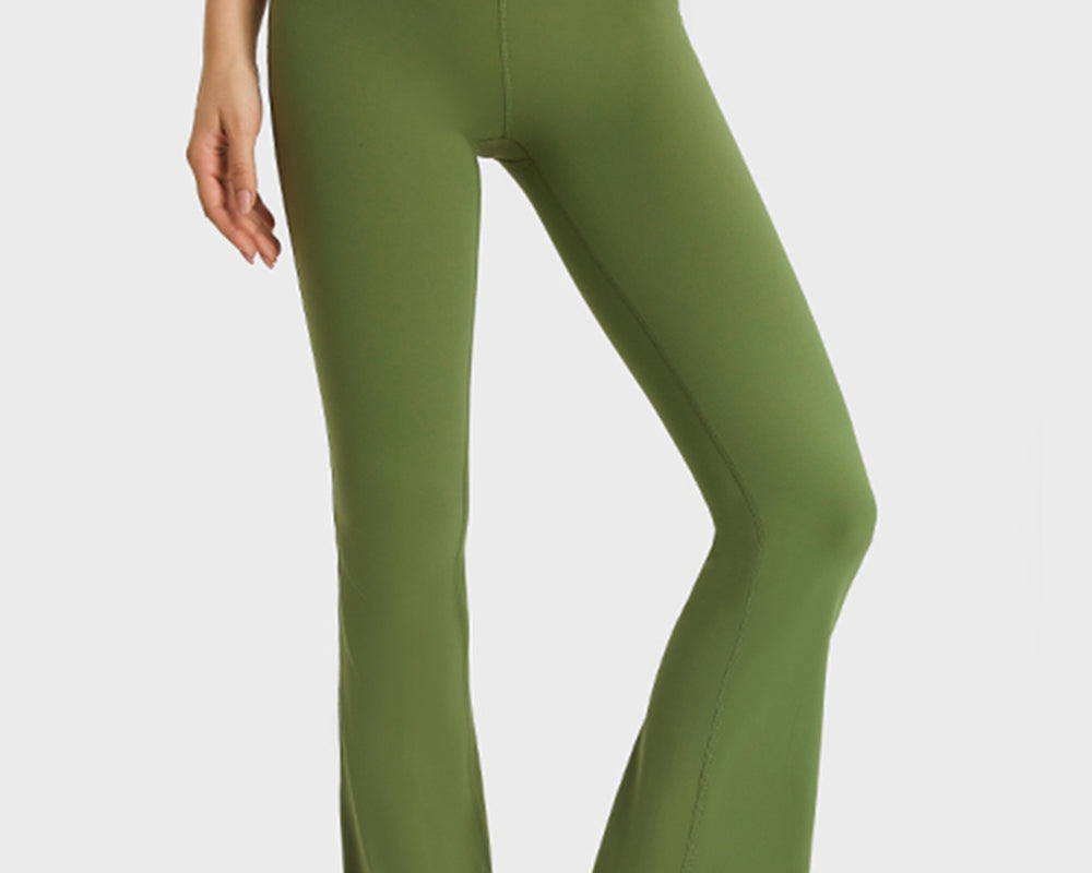 NEWYORKLISTED ACTIVEWEAR COLLECTION: Green yoga pants worn by a person on a white background