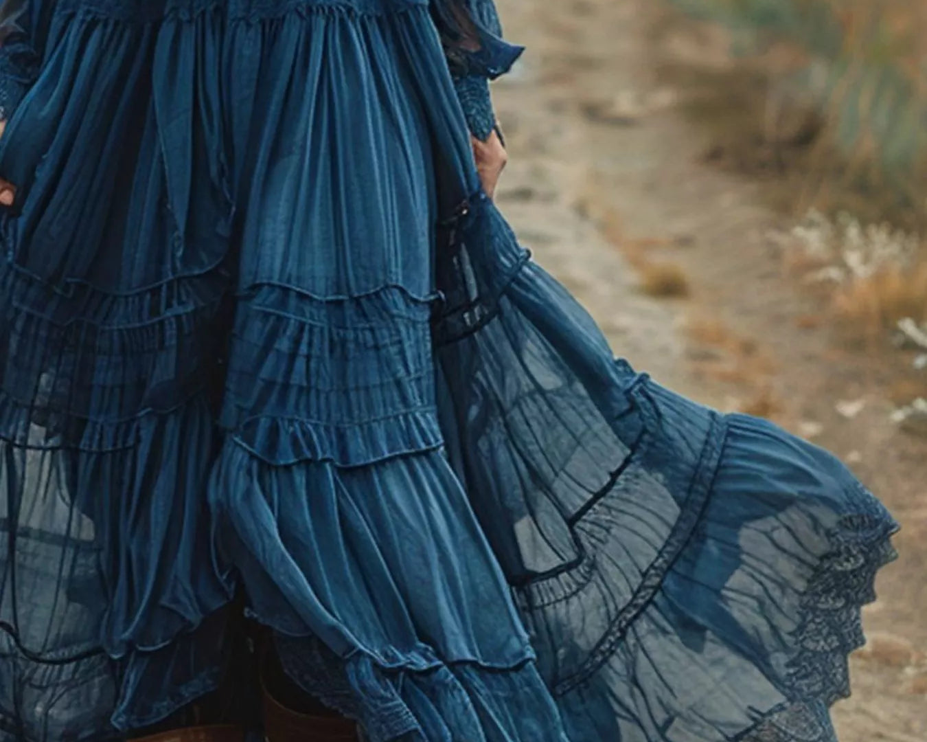NEWYORKLISTED STYLE COLLECTION: Blue tiered skirt with lace details worn by a person in an outdoor setting
