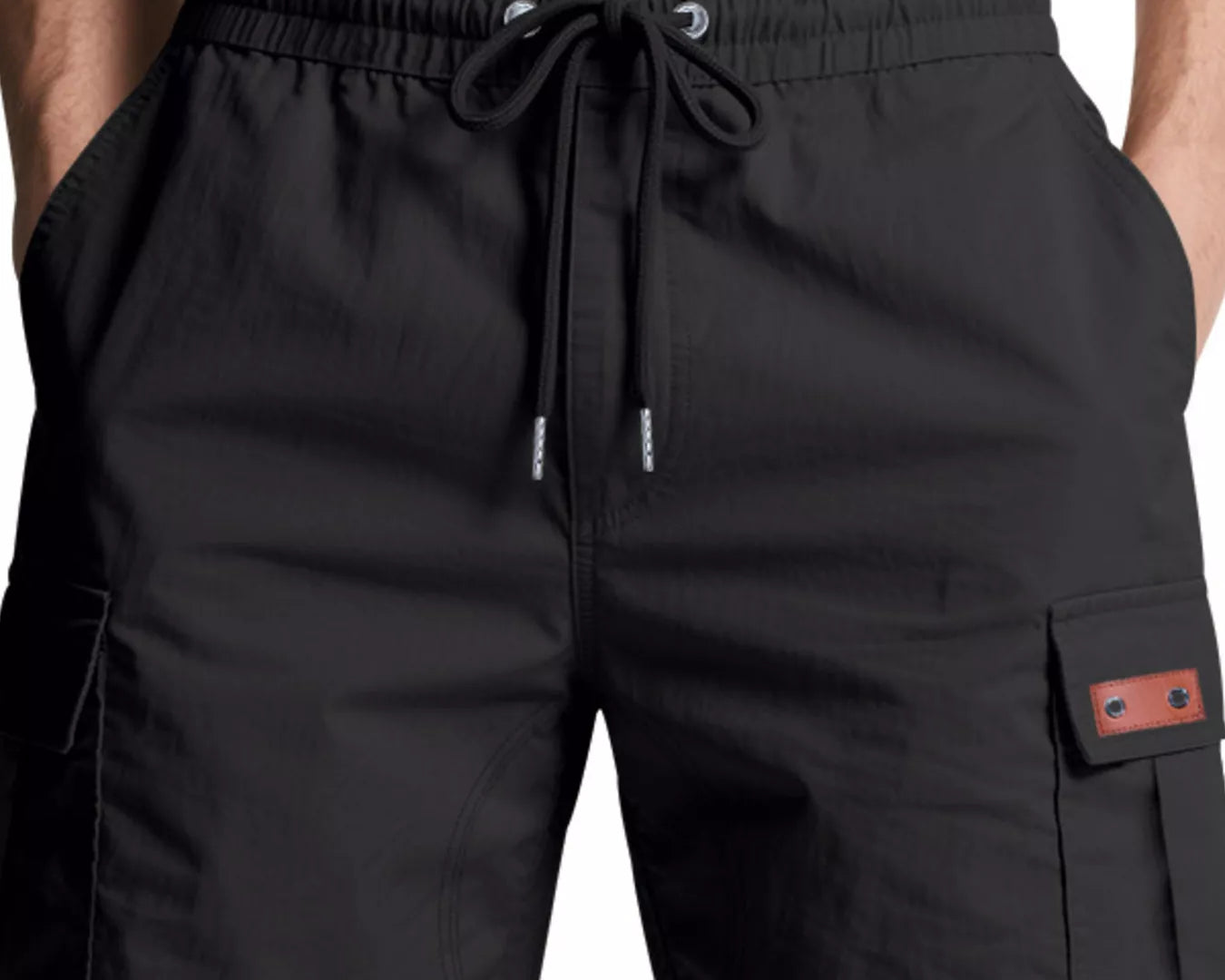 NEWYORKLISTED ATLAS MEN'S COLLECTION: Black cargo shorts with a drawstring on a white background