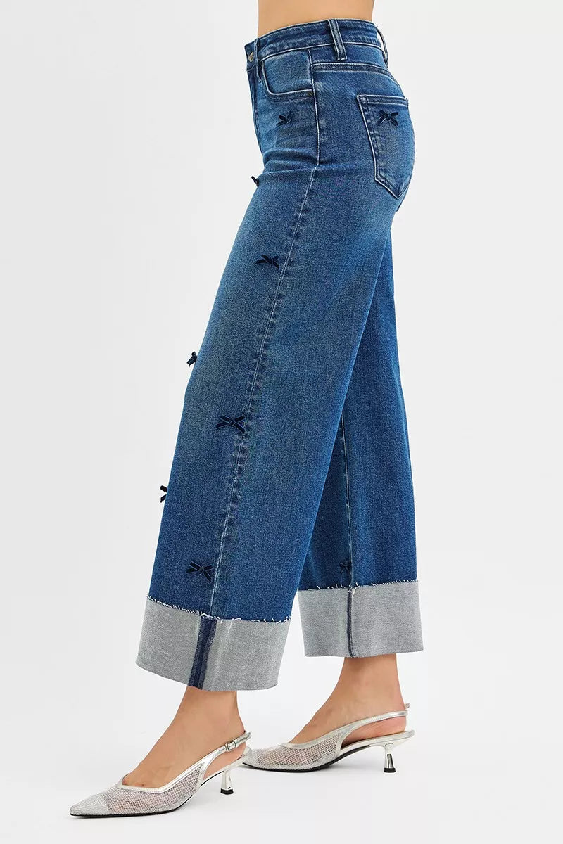 NEWYORKLISTED STYLE COLLECTION: Blue jeans with a gray hem on a white background