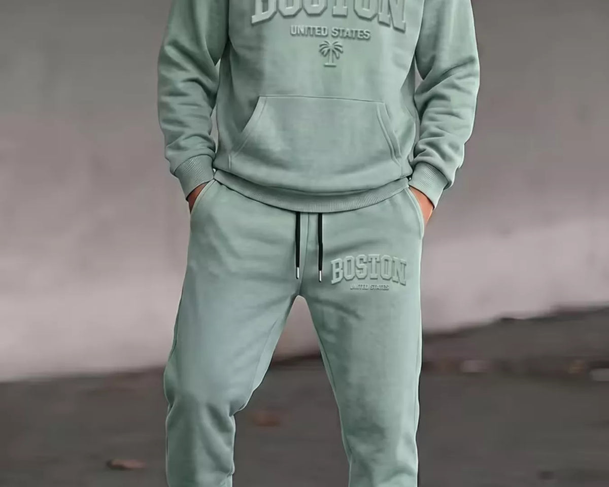 NEWYORKLISTED ATLAS MEN'S COLLECTION: Men's kangaroo-pocket hoodie and pants set, model view