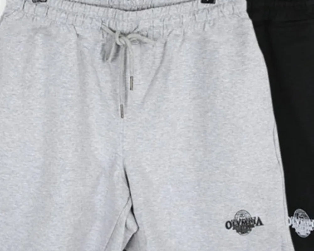 NEWYORKLISTED ATLAS MEN's COLLECTION: Gray shorts with a brand logo on a hanger against a white background