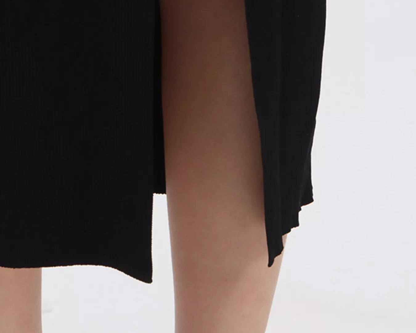 NEWYORKLISTED RUNWAY STYLE: Black sheer skirt being worn on a white background