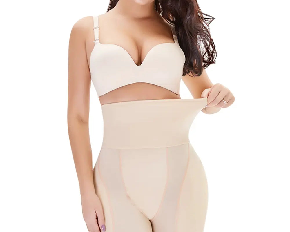NEWYORKLISTED Intimate Apparel: Woman wearing a beige shapewear garment on a white background