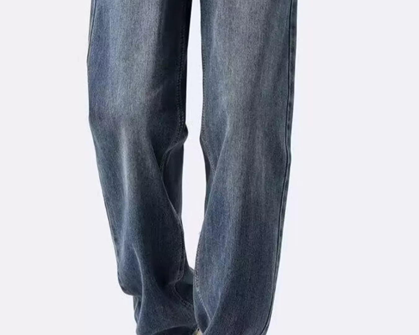NEWYORKLISTED ATLAS MEN's COLLECTION: Person wearing blue jeans and tan shoes on a white background