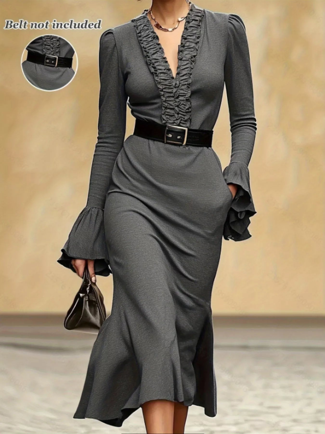 NEWYORKLISTED STYLE COLLECTION: Gray dress with ruffled details on a neutral background