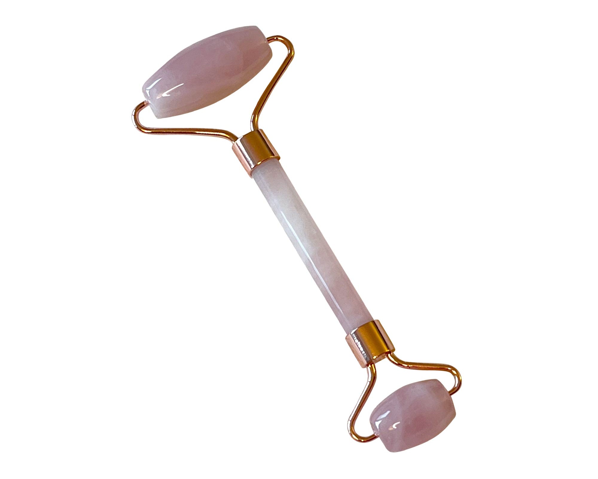 NEWYORKLISTED Cosmetic Collection: Rose quartz facial roller on a white background