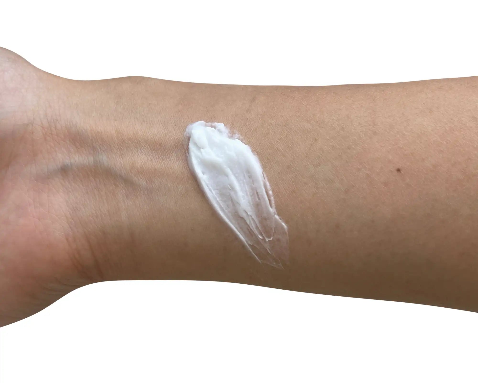 NEWYORKLISTED COSMETIC COLLECTION: White cream applied to a person's arm on a white -background