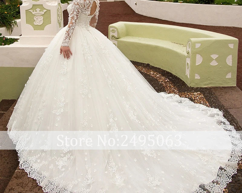 White lace wedding dress with long sleeves in an outdoor setting