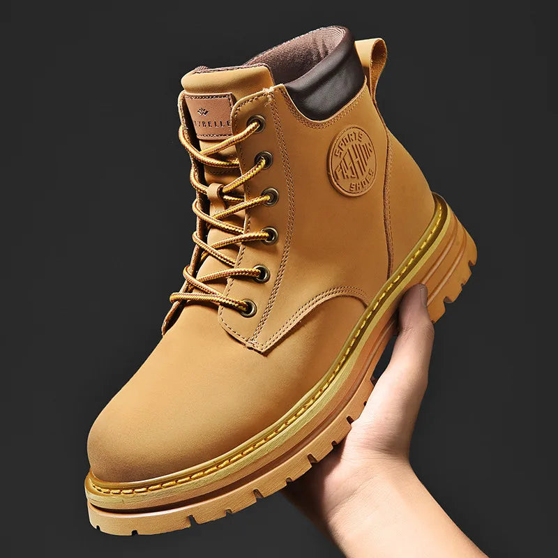 NEWYORKLISTED: Tan leather boot with brand logo held by a hand against a black background