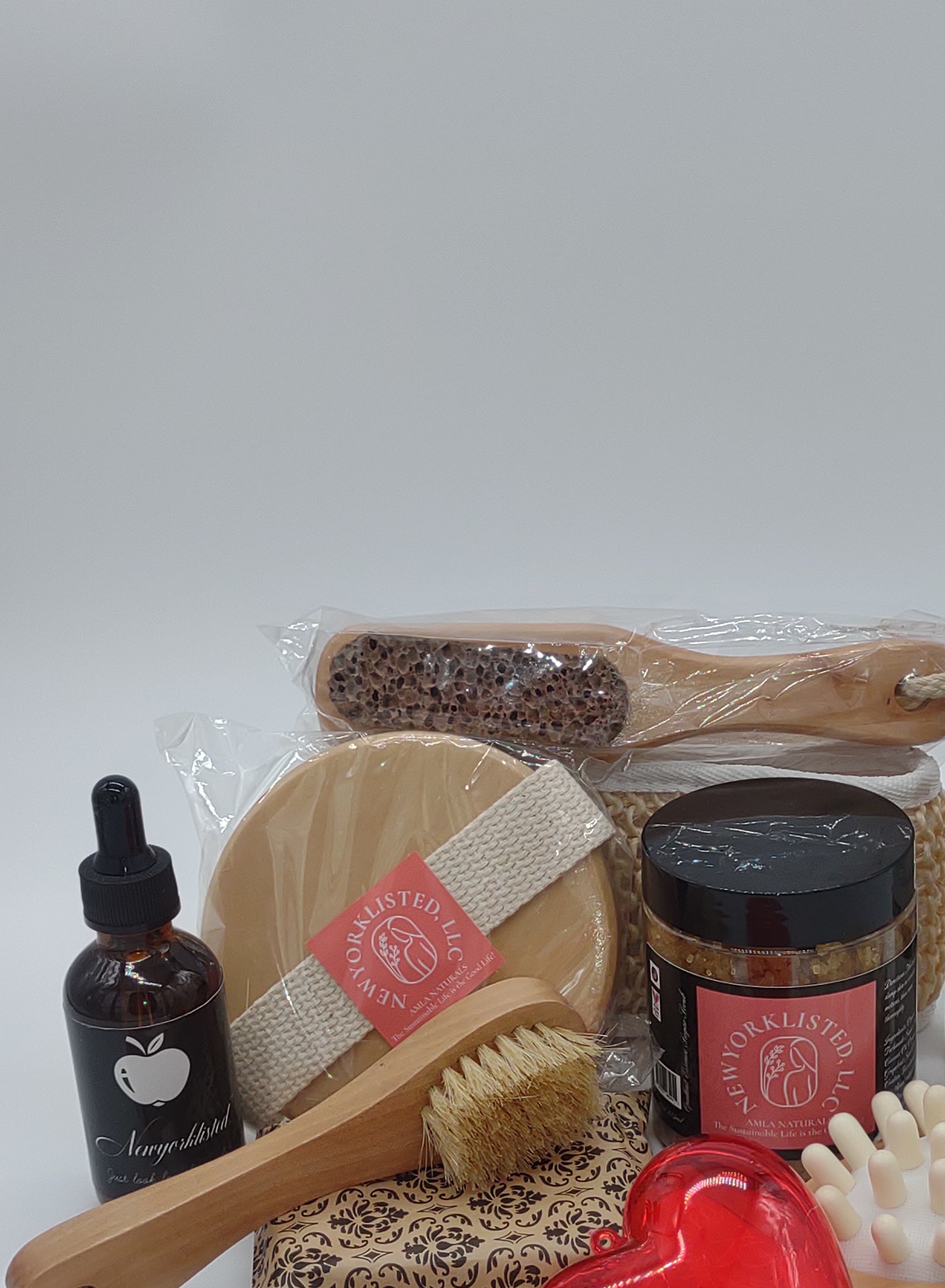 NEWYORKLISTED Valentine’s Day Luxury Spa Gift Basket, Collection of beauty and self-care products on a white background